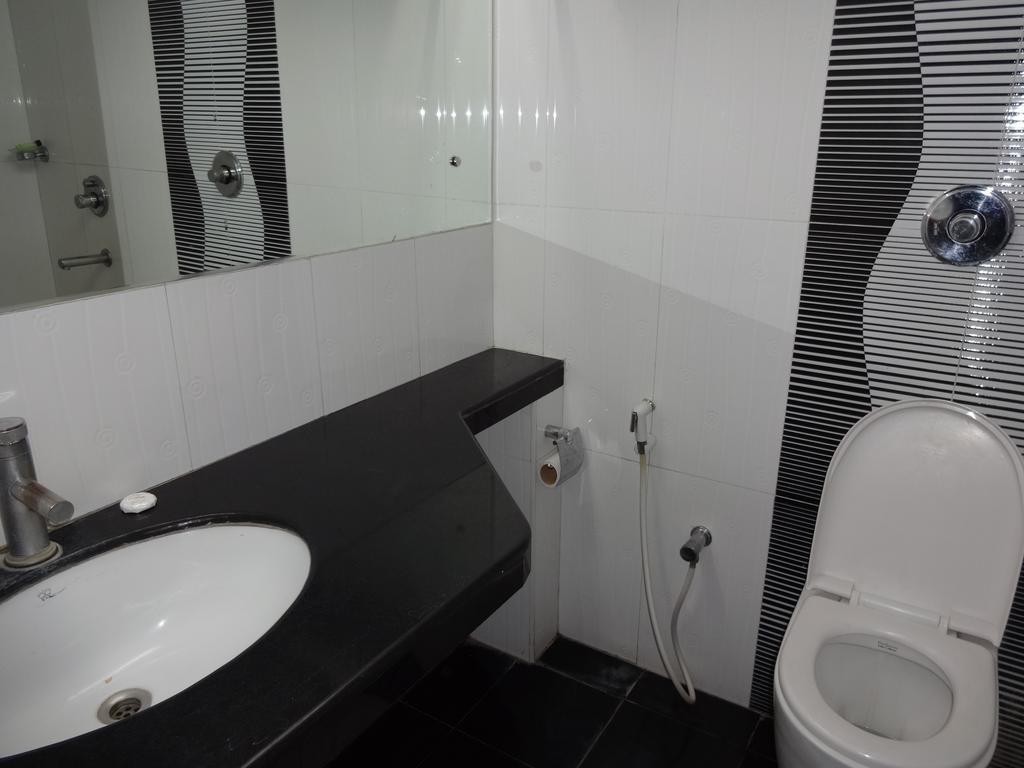 La Hospin Hotel Rājahmundry Pokój zdjęcie